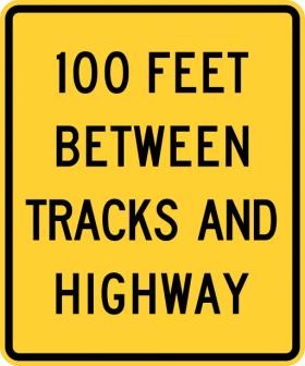 Between Highway And Tracks Sign- W10-11a